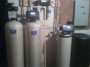 Well water system with iron filter, water softener, and reverse osmosis system.